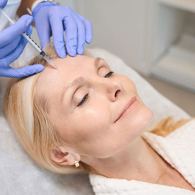 Woman receiving a Botox injection
