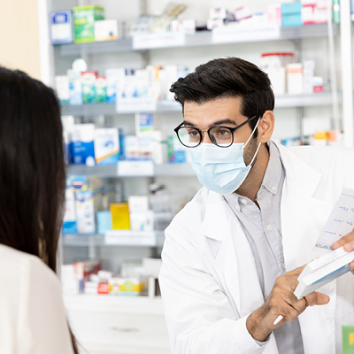 Pharmacist talking to patient  