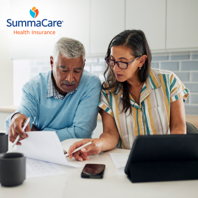 Senior couple looking at paperwork