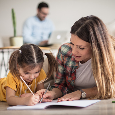 Mom and Daughter writing in a journal