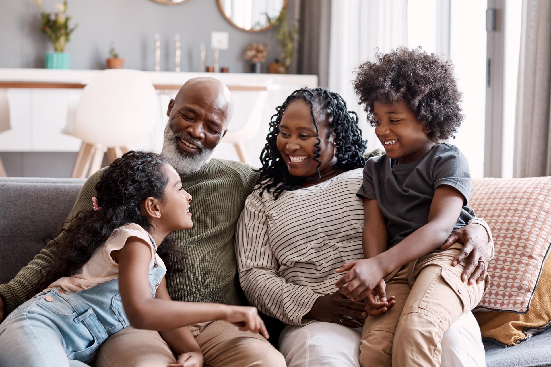 Family sitting on a couch