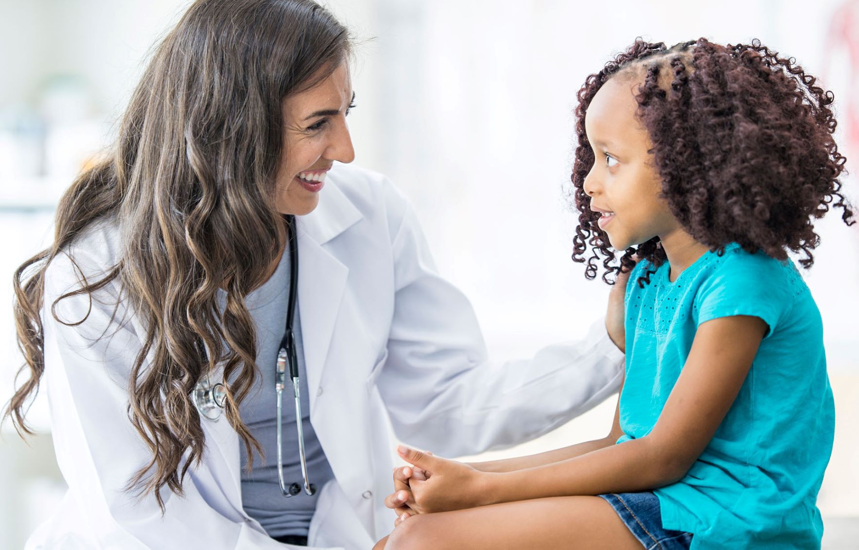 Doctor talking to girl